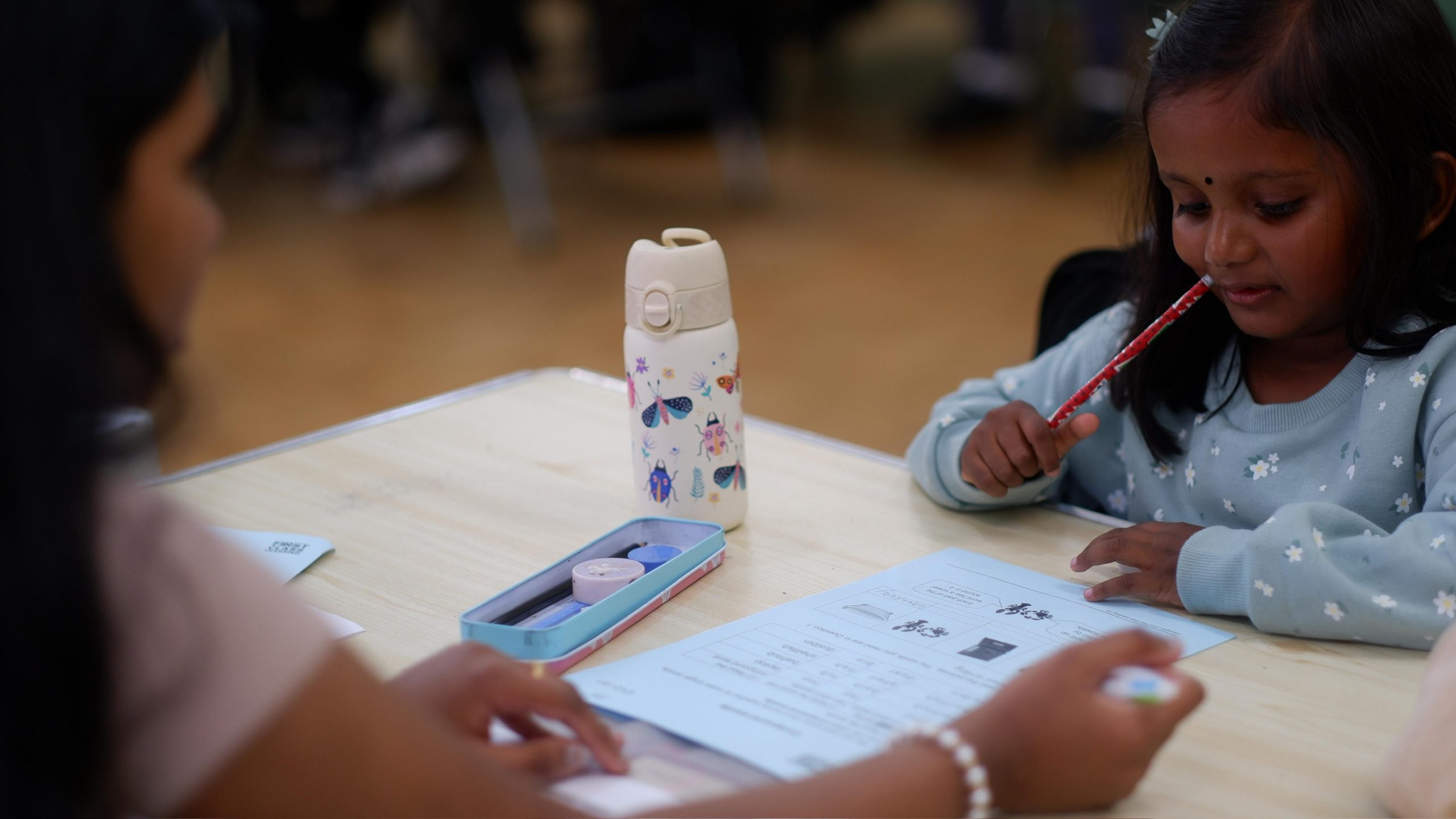 two kids engaged in learning activities